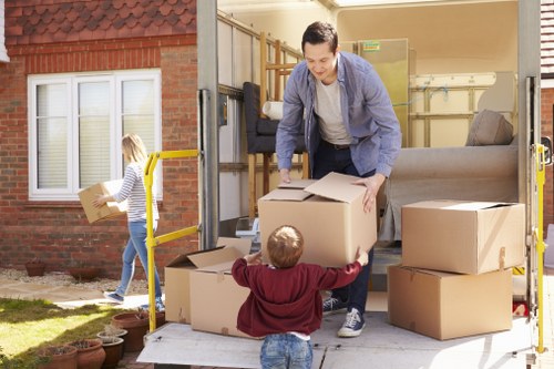 Removal team supporting a local move in Alperton with boxes and furniture