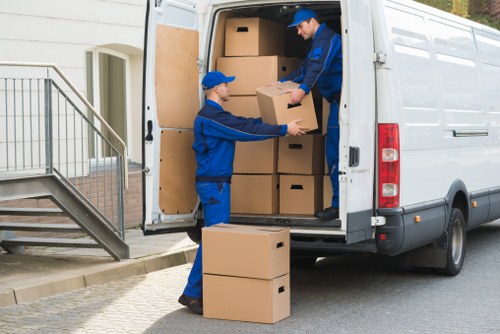 Moving boxes and furniture prepared for a man and van service