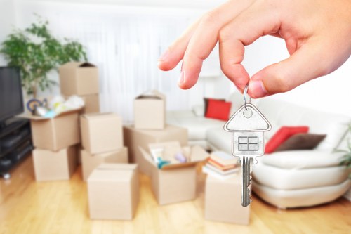 Packed moving boxes and household items prepared for removals in Alperton