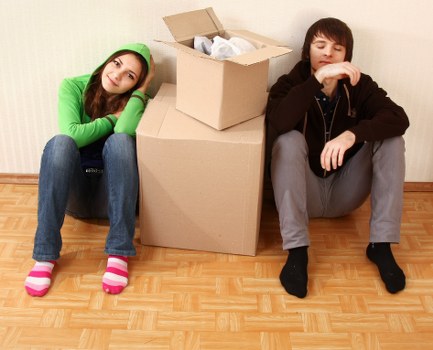 Careful loading of furniture into a moving vehicle for an Alperton property