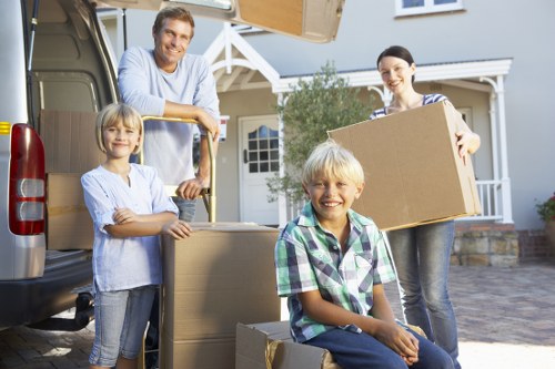 Packed boxes and furniture prepared for collection by a removal company