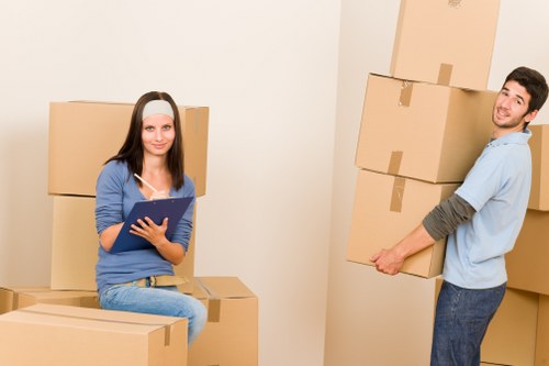 Loading furniture into a removals van near Alperton homes